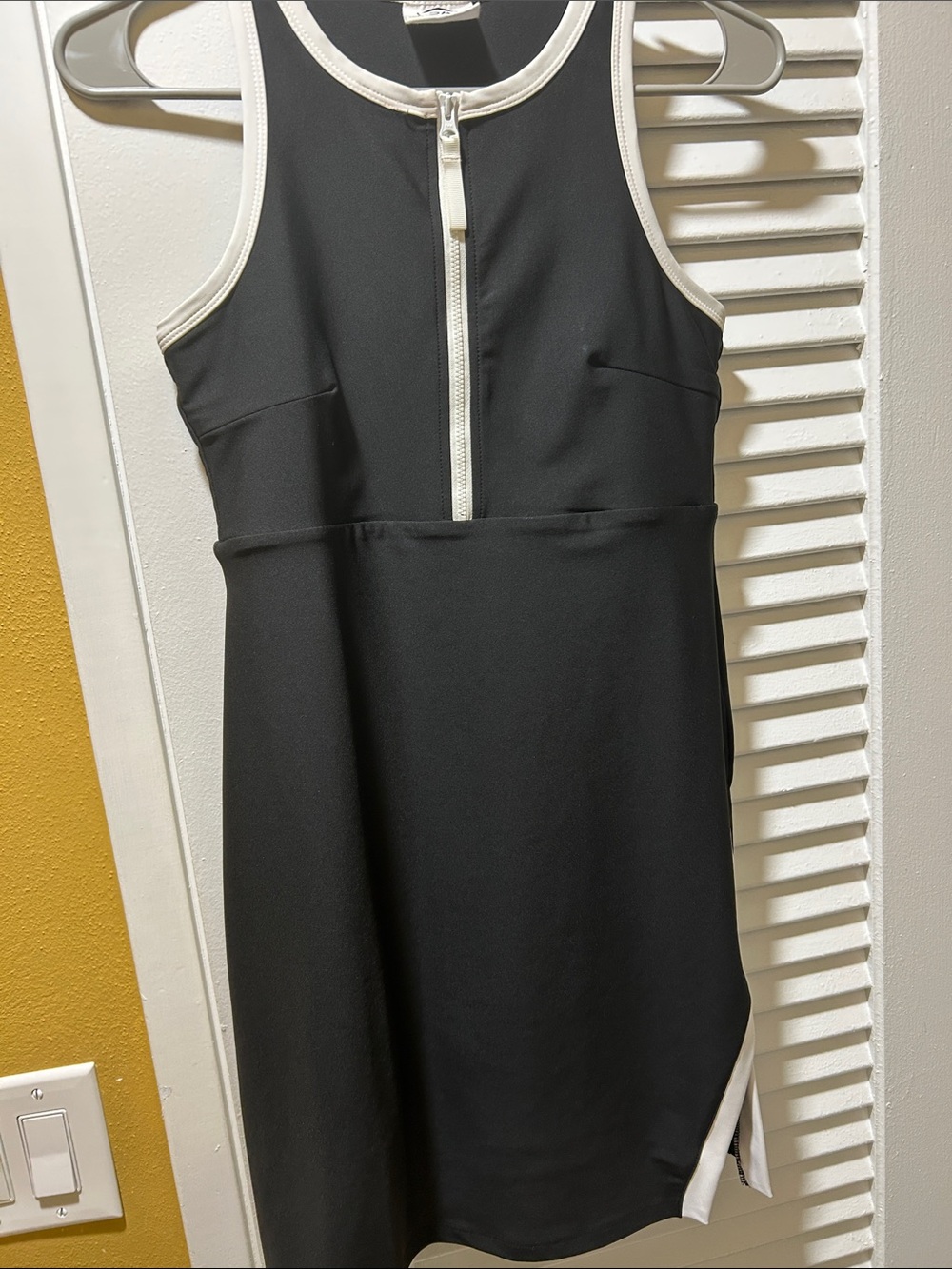Black Sleeveless Zip-Front Mini Skort Dress with White Trim
